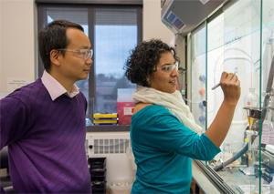 Hang Hubert Yin with Rosaura Padilla-Salinas, a postdoctoral associate in his lab.
