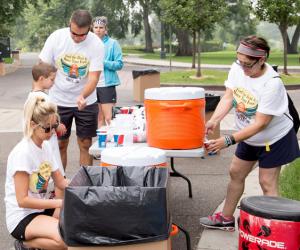 DeCrosta and the CU Health Plan Team staffing a water station at the Plan’s 2016 5k Fun Run event.