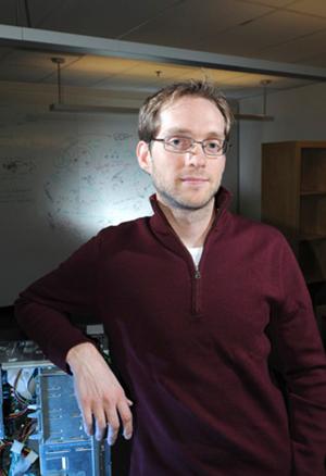 Photo of Aaron Clauset in his lab