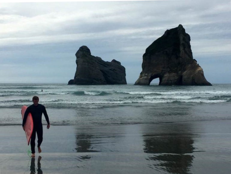 Matthew Hallowell surfing in New Zealand.