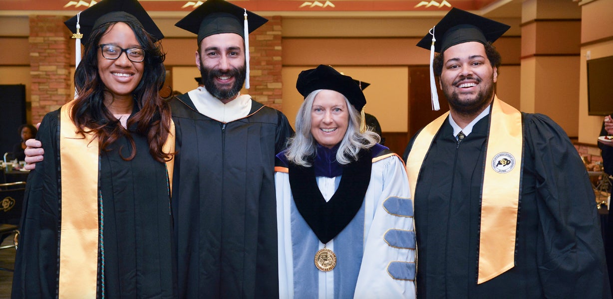 Regent Linda Shoemaker with CU Boulder student leaders at a 2016 graduation ceremony. 