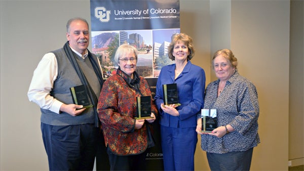 Staff members honored for service to campuses, greater communities