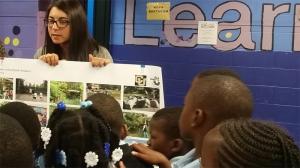 CU Denver student Kacy Roeder with elementary students in Philadelphia, where Lois Brink is extending the Learning Landscapes mission.