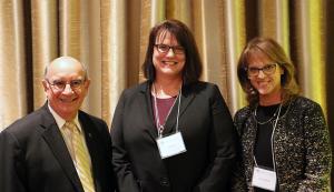 Kelly Fox, center, with Phil DiStefano and Terri Carrothers.