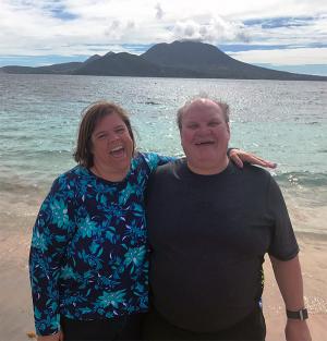 Hicks on the beach with husband Scott.