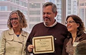 CU OER Awards winner Brad Hinson of CU Denver with CU OER steering committee chair Deb Keyek-Franssen, left, and committee member Ellen Metter.