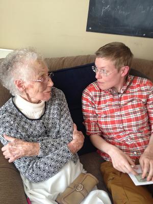 Amy Roberts speaking with her late grandmother Jane Roberts a few years ago at Roberts’ post-thesis-defense celebration dinner.