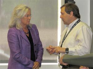 Regent Linda Shoemaker talks with Faculty Council member David Port after last week’s council meeting. 