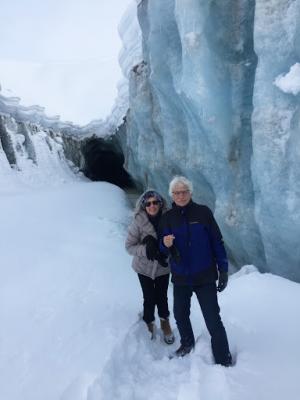 Linda and Steve exploring an Alaskan cave.