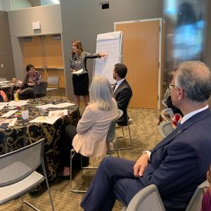 Regent Heidi Ganahl summarizes discussion points during a roundtable session engaging regents, President Mark Kennedy and other CU leaders.