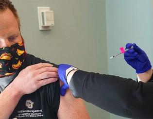 Big shot in the arm: Buoyant mood fills CU Anschutz vaccination clinic 