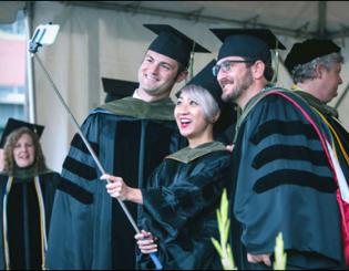 More than 1,000 graduates receive degrees on damp spring day at CU Anschutz