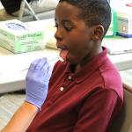 Dental medicine students and faculty provide free screenings at Boys &amp; Girls Club