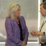 Regent Linda Shoemaker talks with Faculty Council member David Port after last week’s council meeting. 