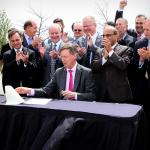 Governor Hickenlooper signs cyber bill into law at UCCS ceremony