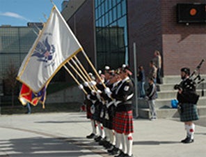 The Scottish American Military Society presents the colors during the processional at the Tribute to Veterans ceremony at Tivoli Commons on Veterans Day, Nov. 11.