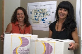 Roxanna Winslow, right, and Mollie Young are transition project managers at the University of Colorado Denver. 