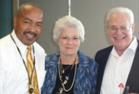 Diann Eason (center) with husband Harold (right) and HR Vice President Darryl Varnado.