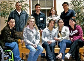 Teresa De Herrera, director of the TRiO Student Support Services program at the university (second from right, top row), Umberto Guerrero (top right) and other students from the TRiO program at UC Denver. De Herrera is the first recipient of the UC Denver Global Ambassador Award from the Office of International Affairs.
