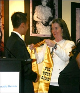 Donna Langston honors an ethnic studies  minor graduate.